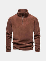 Flat lay of the rust brown quarter-zip pullover